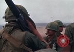 Image of Soldiers landing at Camp Evans from UH-1D helicopter A Shau Valley Vietnam, 1968, second 30 stock footage video 65675026856