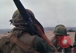 Image of Soldiers landing at Camp Evans from UH-1D helicopter A Shau Valley Vietnam, 1968, second 32 stock footage video 65675026856