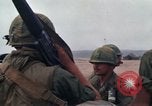 Image of Soldiers landing at Camp Evans from UH-1D helicopter A Shau Valley Vietnam, 1968, second 34 stock footage video 65675026856