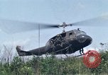 Image of Soldiers landing at Camp Evans from UH-1D helicopter A Shau Valley Vietnam, 1968, second 35 stock footage video 65675026856