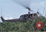Image of Soldiers landing at Camp Evans from UH-1D helicopter A Shau Valley Vietnam, 1968, second 37 stock footage video 65675026856