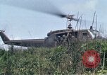 Image of Soldiers landing at Camp Evans from UH-1D helicopter A Shau Valley Vietnam, 1968, second 38 stock footage video 65675026856