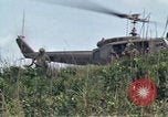 Image of Soldiers landing at Camp Evans from UH-1D helicopter A Shau Valley Vietnam, 1968, second 41 stock footage video 65675026856