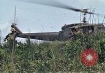 Image of Soldiers landing at Camp Evans from UH-1D helicopter A Shau Valley Vietnam, 1968, second 42 stock footage video 65675026856