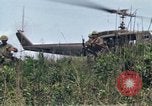 Image of Soldiers landing at Camp Evans from UH-1D helicopter A Shau Valley Vietnam, 1968, second 43 stock footage video 65675026856