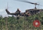 Image of Soldiers landing at Camp Evans from UH-1D helicopter A Shau Valley Vietnam, 1968, second 44 stock footage video 65675026856