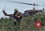 Image of Soldiers landing at Camp Evans from UH-1D helicopter A Shau Valley Vietnam, 1968, second 47 stock footage video 65675026856