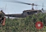 Image of Soldiers landing at Camp Evans from UH-1D helicopter A Shau Valley Vietnam, 1968, second 49 stock footage video 65675026856