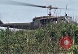 Image of Soldiers landing at Camp Evans from UH-1D helicopter A Shau Valley Vietnam, 1968, second 51 stock footage video 65675026856