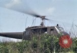 Image of Soldiers landing at Camp Evans from UH-1D helicopter A Shau Valley Vietnam, 1968, second 53 stock footage video 65675026856