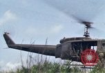 Image of Soldiers landing at Camp Evans from UH-1D helicopter A Shau Valley Vietnam, 1968, second 55 stock footage video 65675026856