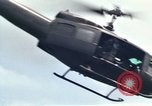 Image of Soldiers landing at Camp Evans from UH-1D helicopter A Shau Valley Vietnam, 1968, second 58 stock footage video 65675026856
