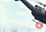Image of Soldiers landing at Camp Evans from UH-1D helicopter A Shau Valley Vietnam, 1968, second 59 stock footage video 65675026856