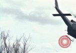 Image of Soldiers landing at Camp Evans from UH-1D helicopter A Shau Valley Vietnam, 1968, second 60 stock footage video 65675026856