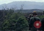 Image of Soldiers landing at Camp Evans from UH-1D helicopter A Shau Valley Vietnam, 1968, second 62 stock footage video 65675026856