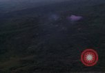 Image of UH-1Ds helicopters flying over the mountains A Shau Valley Vietnam, 1968, second 13 stock footage video 65675026857