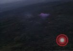Image of UH-1Ds helicopters flying over the mountains A Shau Valley Vietnam, 1968, second 15 stock footage video 65675026857