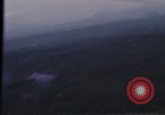 Image of UH-1Ds helicopters flying over the mountains A Shau Valley Vietnam, 1968, second 18 stock footage video 65675026857