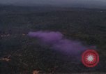Image of UH-1Ds helicopters flying over the mountains A Shau Valley Vietnam, 1968, second 19 stock footage video 65675026857