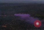 Image of UH-1Ds helicopters flying over the mountains A Shau Valley Vietnam, 1968, second 20 stock footage video 65675026857