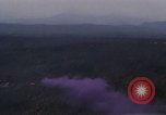 Image of UH-1Ds helicopters flying over the mountains A Shau Valley Vietnam, 1968, second 21 stock footage video 65675026857