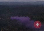 Image of UH-1Ds helicopters flying over the mountains A Shau Valley Vietnam, 1968, second 22 stock footage video 65675026857