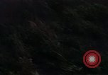 Image of UH-1Ds helicopters flying over the mountains A Shau Valley Vietnam, 1968, second 29 stock footage video 65675026857