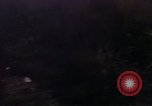 Image of UH-1Ds helicopters flying over the mountains A Shau Valley Vietnam, 1968, second 32 stock footage video 65675026857