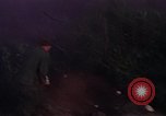 Image of UH-1Ds helicopters flying over the mountains A Shau Valley Vietnam, 1968, second 33 stock footage video 65675026857