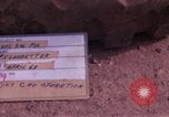 Image of UH-1Ds helicopters flying over the mountains A Shau Valley Vietnam, 1968, second 45 stock footage video 65675026857