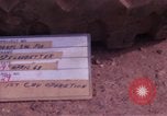 Image of UH-1Ds helicopters flying over the mountains A Shau Valley Vietnam, 1968, second 50 stock footage video 65675026857