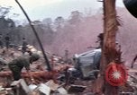 Image of Wrecked US Army UH-1H helicopter A Shau Valley Vietnam, 1968, second 1 stock footage video 65675026858