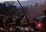 Image of Wrecked US Army UH-1H helicopter A Shau Valley Vietnam, 1968, second 4 stock footage video 65675026858