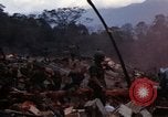Image of Wrecked US Army UH-1H helicopter A Shau Valley Vietnam, 1968, second 5 stock footage video 65675026858