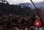 Image of Wrecked US Army UH-1H helicopter A Shau Valley Vietnam, 1968, second 6 stock footage video 65675026858