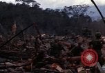 Image of Wrecked US Army UH-1H helicopter A Shau Valley Vietnam, 1968, second 7 stock footage video 65675026858