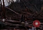 Image of Wrecked US Army UH-1H helicopter A Shau Valley Vietnam, 1968, second 11 stock footage video 65675026858