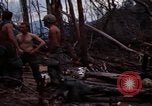 Image of Wrecked US Army UH-1H helicopter A Shau Valley Vietnam, 1968, second 14 stock footage video 65675026858