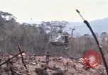 Image of Wrecked US Army UH-1H helicopter A Shau Valley Vietnam, 1968, second 16 stock footage video 65675026858