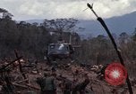 Image of Wrecked US Army UH-1H helicopter A Shau Valley Vietnam, 1968, second 20 stock footage video 65675026858