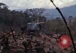 Image of Wrecked US Army UH-1H helicopter A Shau Valley Vietnam, 1968, second 22 stock footage video 65675026858