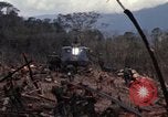 Image of Wrecked US Army UH-1H helicopter A Shau Valley Vietnam, 1968, second 27 stock footage video 65675026858