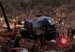 Image of Wrecked US Army UH-1H helicopter A Shau Valley Vietnam, 1968, second 29 stock footage video 65675026858