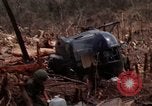 Image of Wrecked US Army UH-1H helicopter A Shau Valley Vietnam, 1968, second 30 stock footage video 65675026858