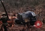 Image of Wrecked US Army UH-1H helicopter A Shau Valley Vietnam, 1968, second 36 stock footage video 65675026858