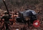 Image of Wrecked US Army UH-1H helicopter A Shau Valley Vietnam, 1968, second 37 stock footage video 65675026858