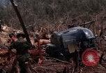 Image of Wrecked US Army UH-1H helicopter A Shau Valley Vietnam, 1968, second 38 stock footage video 65675026858