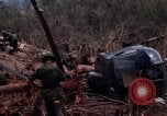 Image of Wrecked US Army UH-1H helicopter A Shau Valley Vietnam, 1968, second 40 stock footage video 65675026858