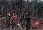 Image of Wrecked US Army UH-1H helicopter A Shau Valley Vietnam, 1968, second 42 stock footage video 65675026858