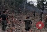 Image of Wrecked US Army UH-1H helicopter A Shau Valley Vietnam, 1968, second 45 stock footage video 65675026858